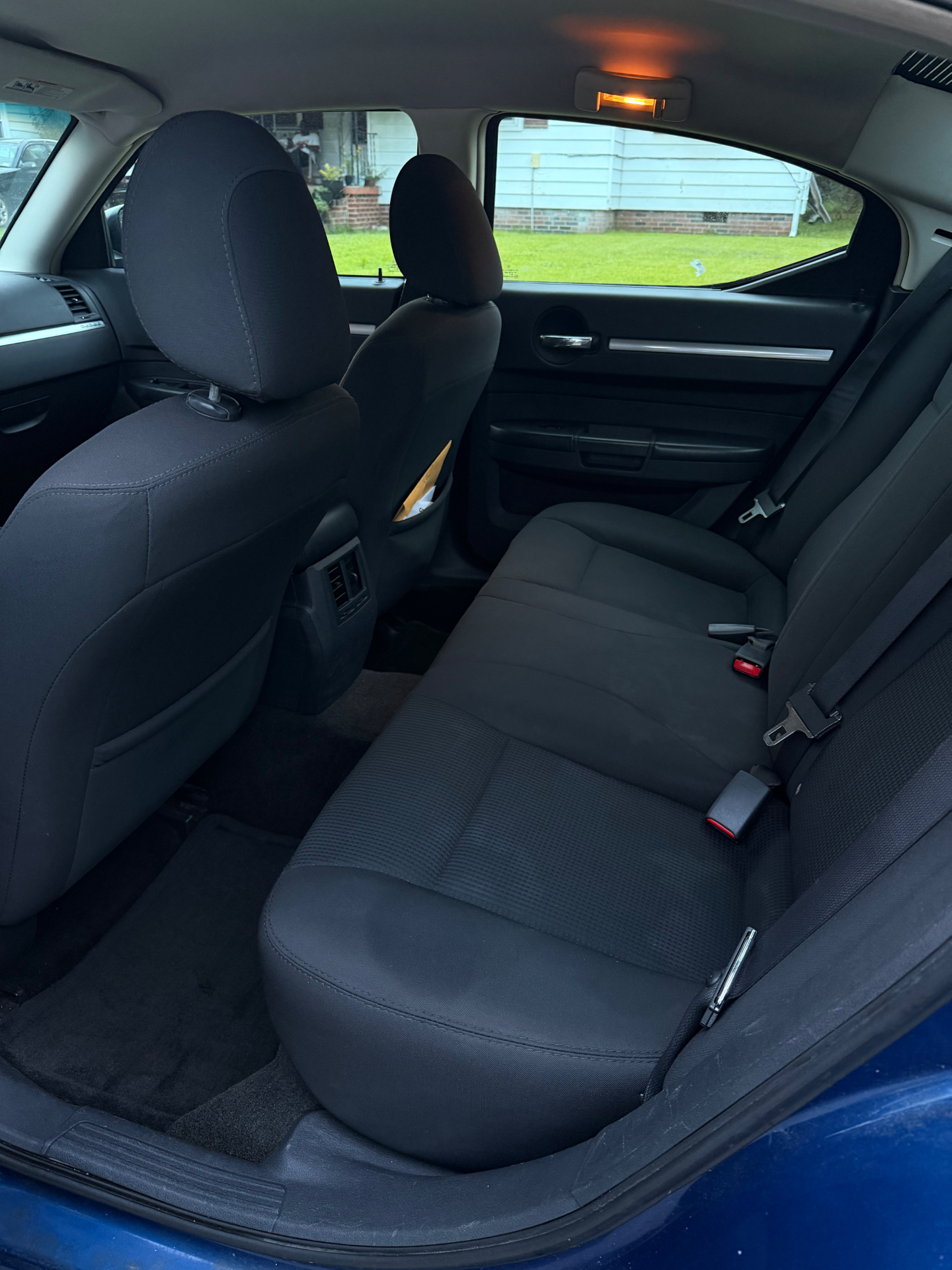 Same rear car seat clean after shampoo and hot-water extraction by JDM Detailing
