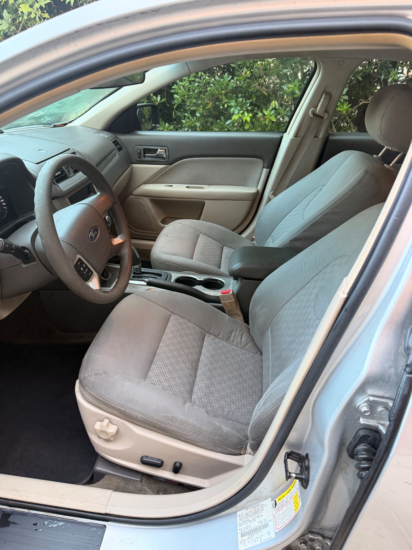 Beige front car seat clean after seat shampoo and extraction